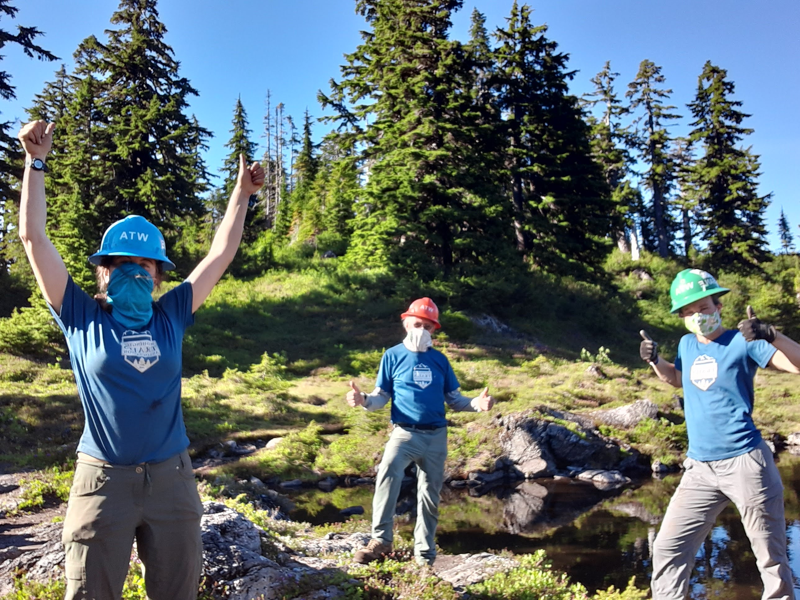 Masked trail work volunteers. Photo by JT Hart. 