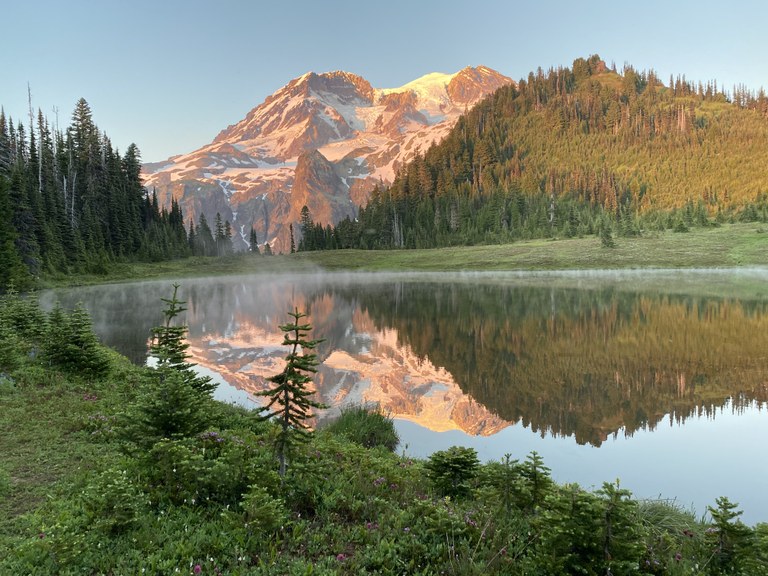 Mount Rainier reflected in a small lake.