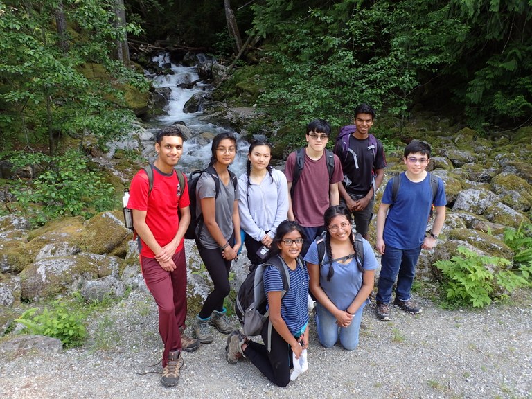 group in front of waterfall.JPG