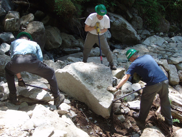 Three Fireside Circle members volunteer on the Pratt Connector Trail. Photo by Greg Friend