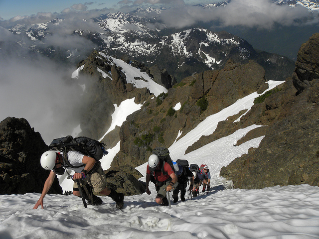 A party of Mountaineers scramblers climbs The Brothers on the Olympic Peninsula. Photo by Chris Pribbernow. 