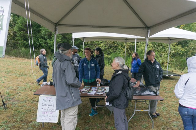 Hikers getting advice from experts on planning their next outing. Photo by Erik Haugen-Goodman.