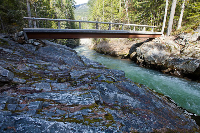 The bridge in to McAllister Camp on the Thunder Creek trail. Photo by Ben Fox. 