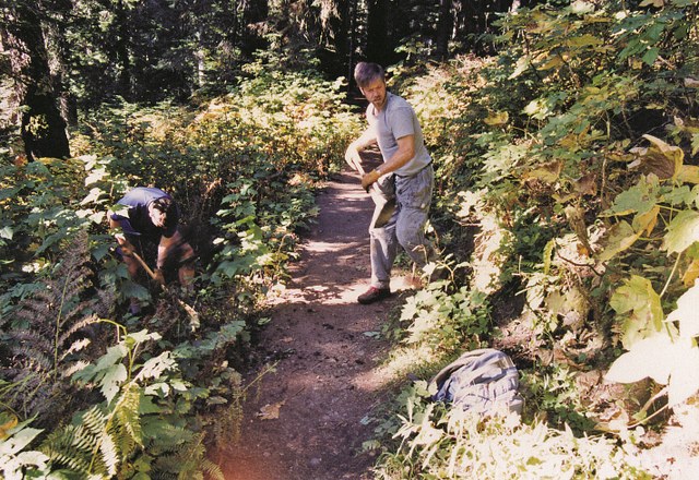 Dan Whitaker and Steve Dean working on the PCT at Kendall Katwalk in the early days of the trail maintenance program. Photo by Karl Forsgaard.