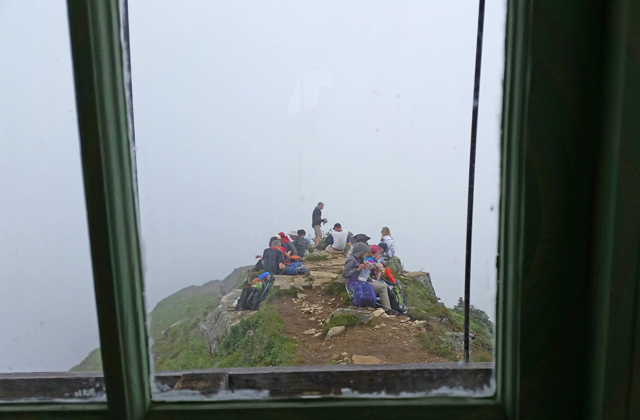 Lots of hikers visiting on Saturday hoping for a view. Photo by Anna Roth. 