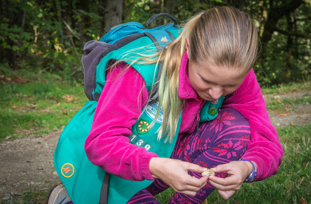 elena boyle examining a mushroom archana bhat Sparking curiosity about nature is part of the adventure of being a Girls Scout. Photo by Archana Bhat.