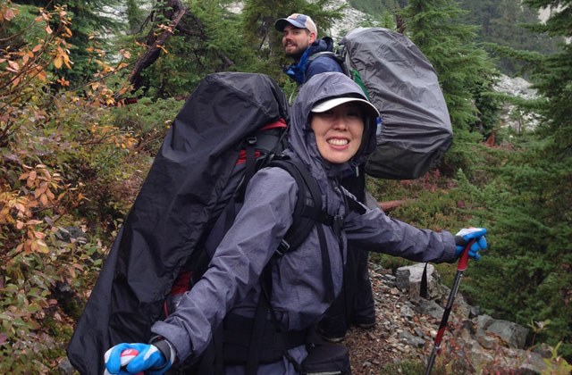 Hikers smile on the way along the PCT for a trail maintenance trip. Photo by Bob Cowdrick
