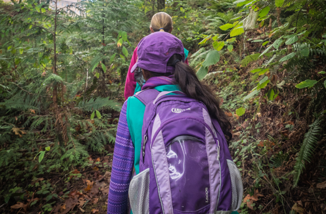 Elena and Anishka head down one of many trails at Saint Edward State Park. Photo by Archana Bhat.