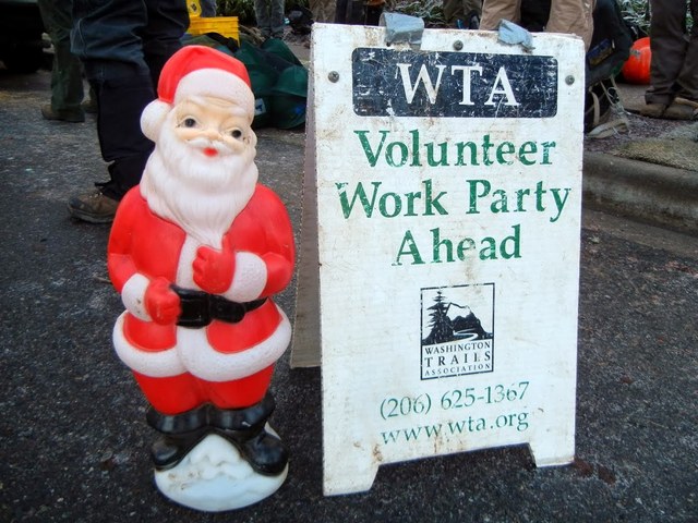 Santa points the way to the work site. Photo by Julie Cassata. 