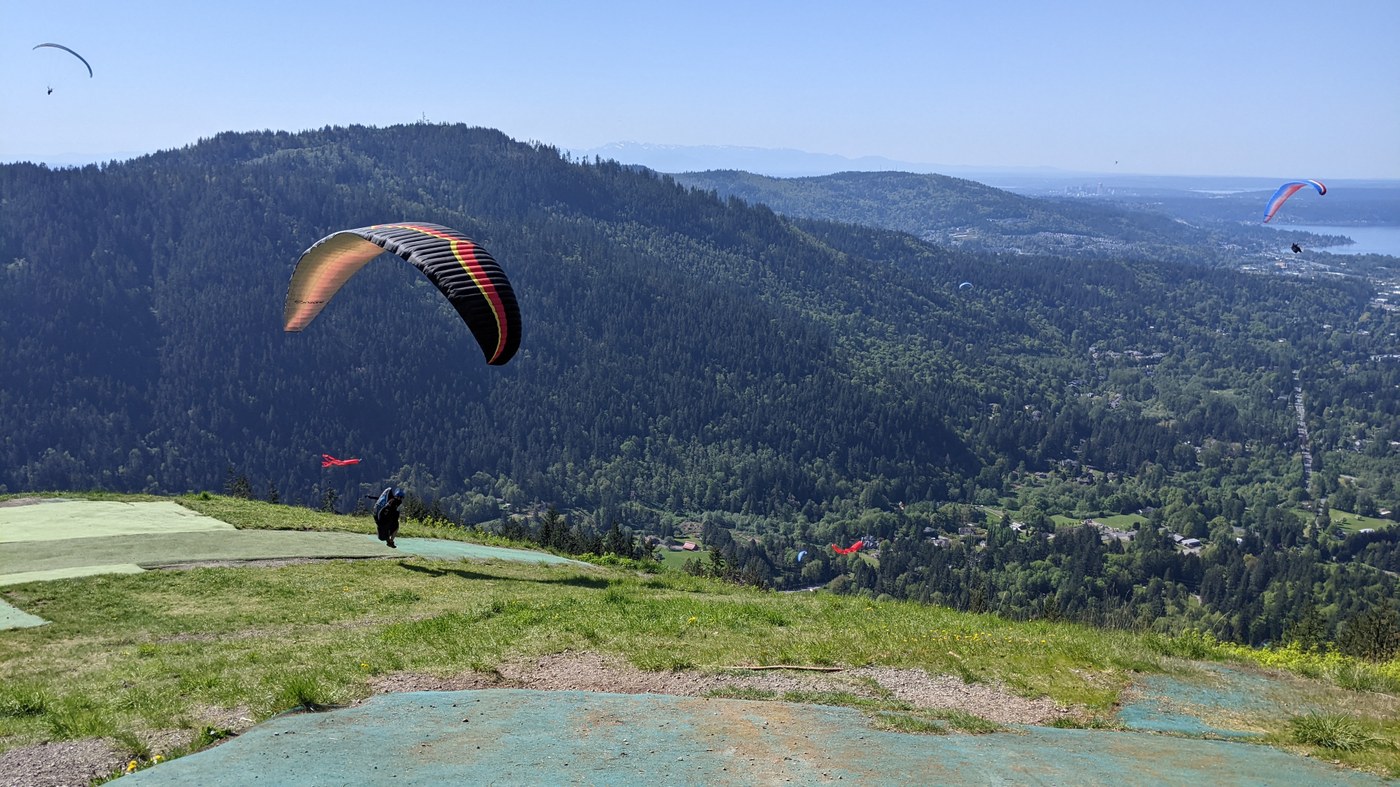 Poo Poo Point. Photo by mcblaine. Paraglider taking off from the summit of Poo Poo Point. Photo by trip reporter mcblaine.