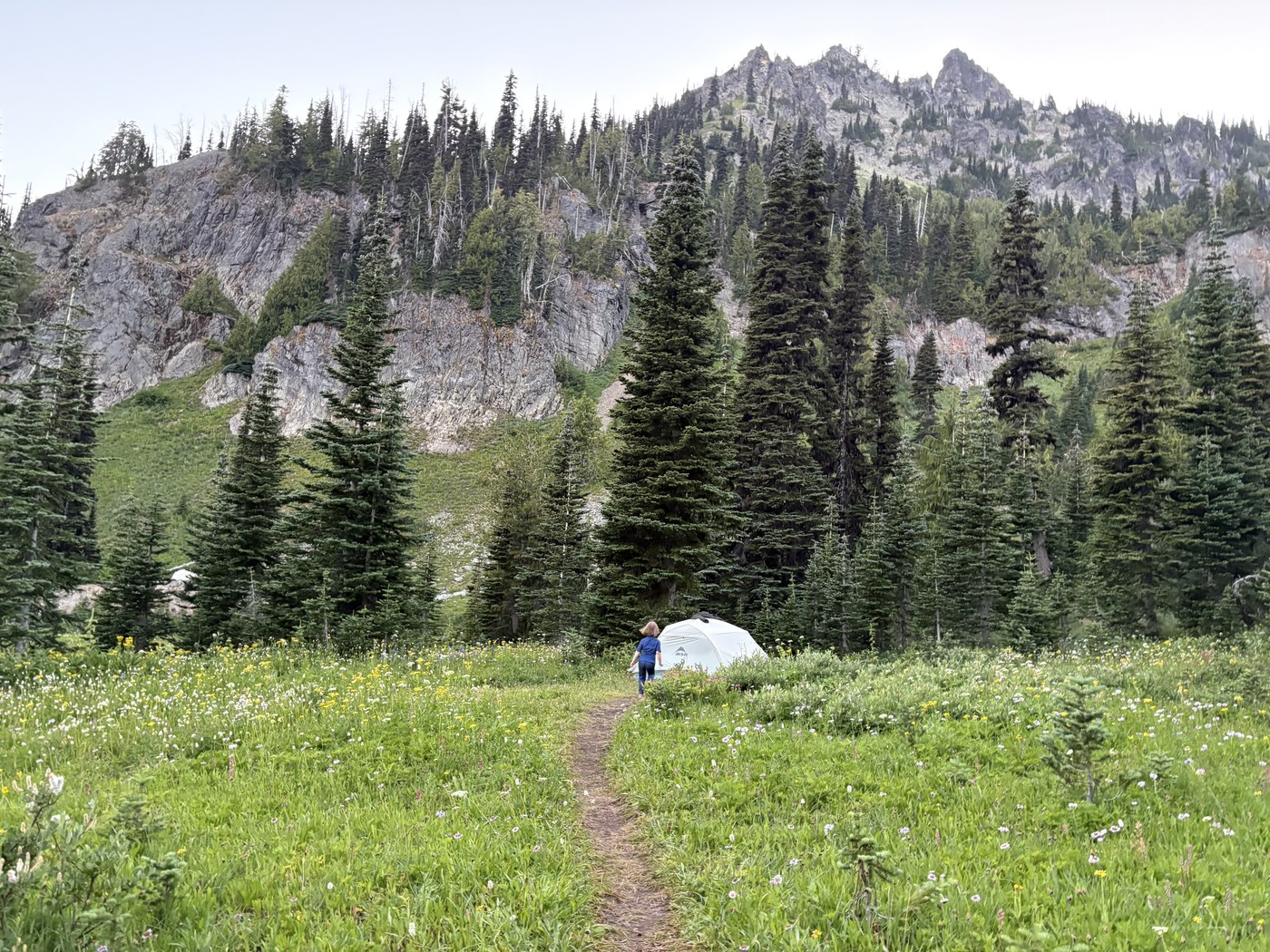 A child runs toward a tent at Sheep Lake. Photo by trip reporter MuffinCity.