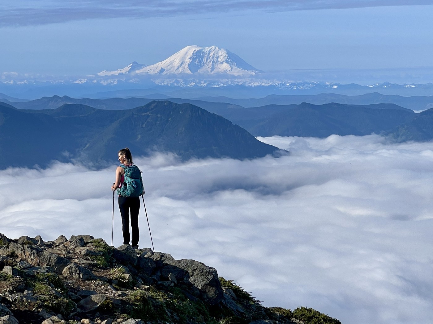 Mount Teneriffe. Photo by Kristen H. A hiker and view of Mount Rainier from the summit of Mount Teneriffe. Photo by trip reporter Kristen H.