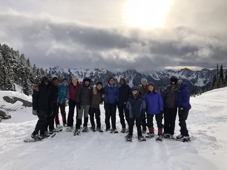 A 2018 Y-WE snowshoeing trip at Mount Rainier group photo. Photo by Katie Love.
